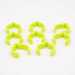 Pack of 8 ECO cable clips for Festool Plug-it D27 dust extractor hose, shown in bright green colour on a white background.